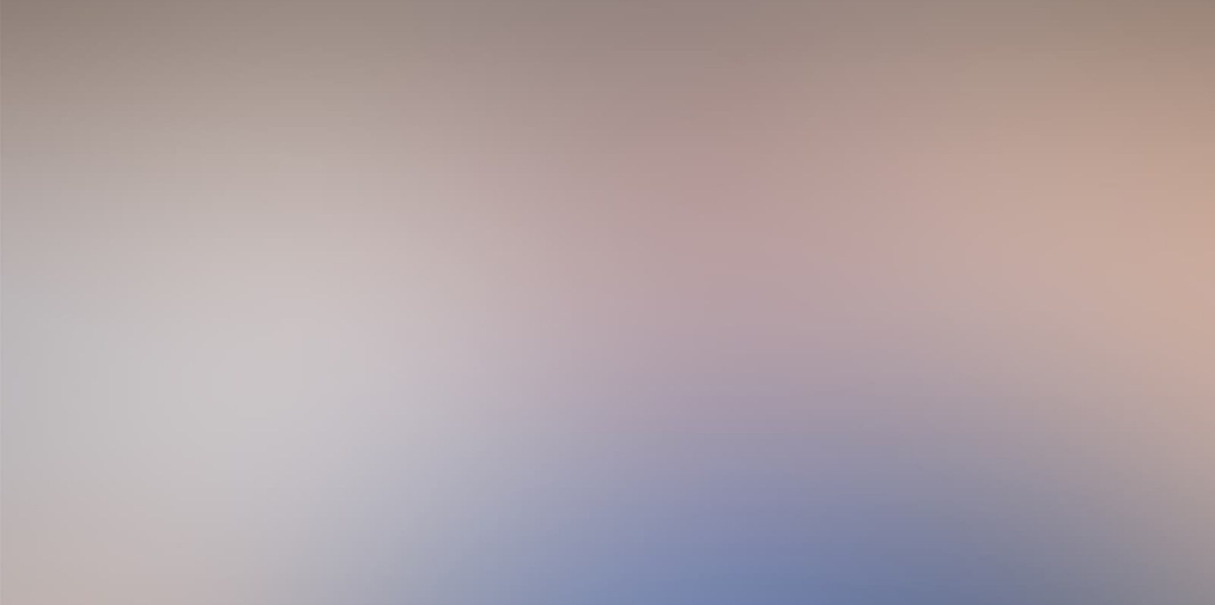 large-filler A blurred image with indistinguishable colors and shapes, making it difficult to identify any specific objects or details.