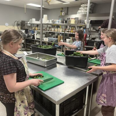 kids chopping cucumbers