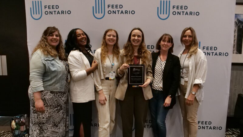 The food bank of waterloo region staff with their award.