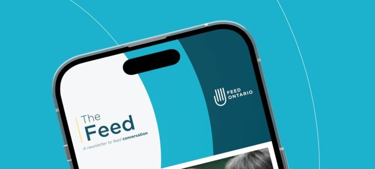 An iphone with Feed Ontario's newsletter, The Feed, displayed on screen.