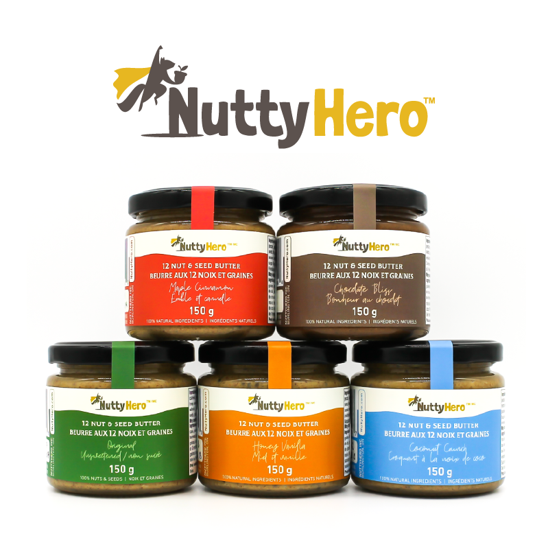 Five jars of Nutty Hero nut and seed butter are stacked, each with different colored labels. The Nutty Hero logo is displayed above the jars.